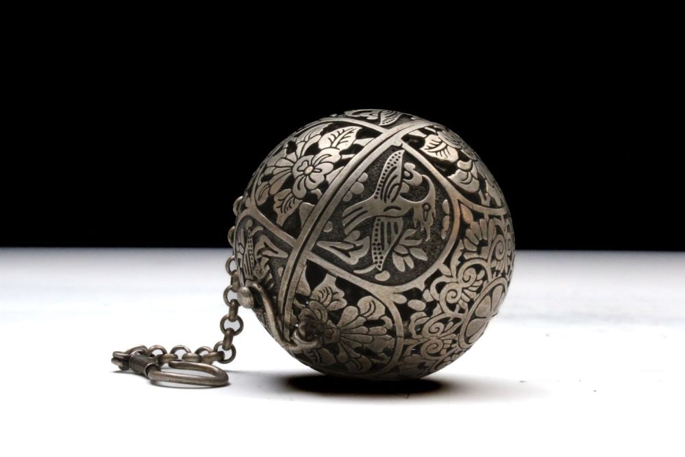 Lot 76: An Islamic White Metal Incense Burner with Beautiful...