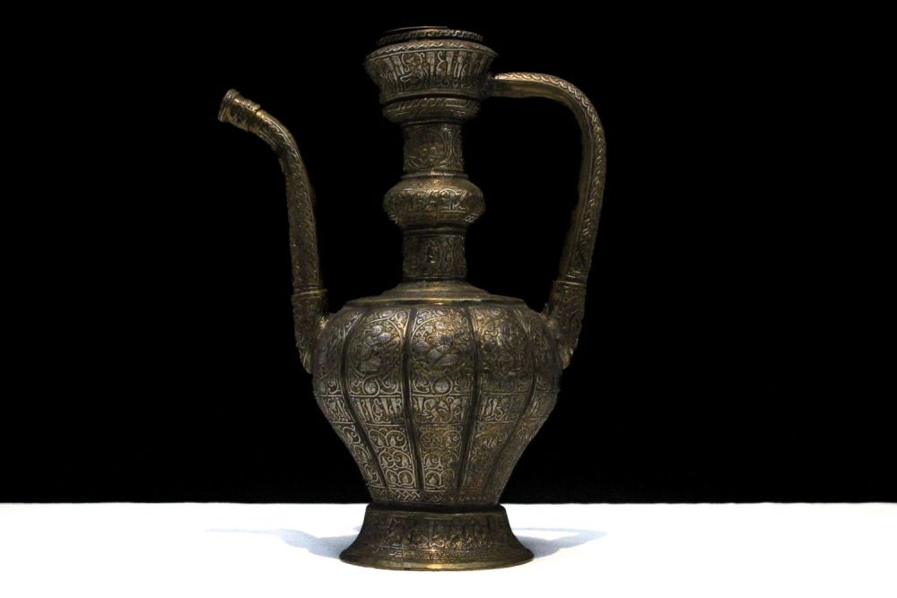 Lot 90: An Islamic Khorasan Style Brass Ewer Aftaba with...