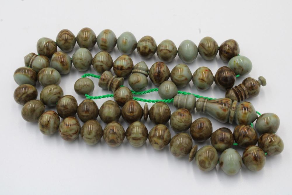 Lot 131: An Islamic Bakelite Prayer Beads.