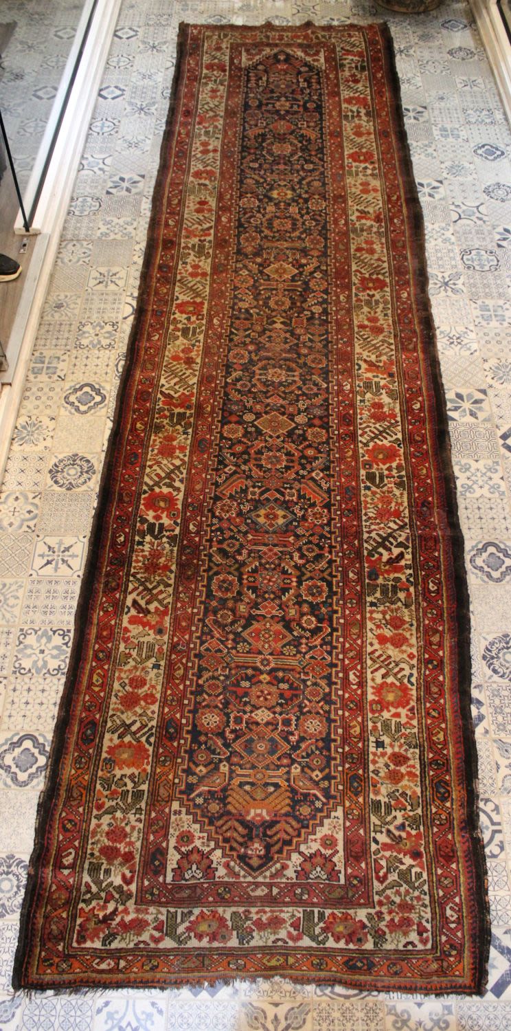Lot 139: A Persian Shiraz Runner Rug from the 19th...