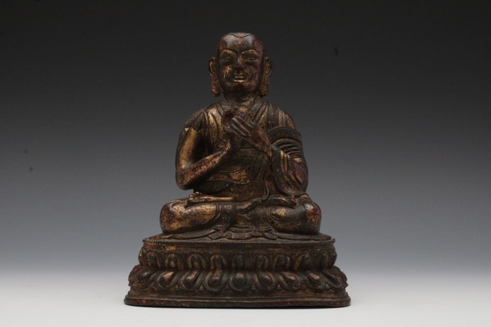 Lot 176: A Chinese Tibetan Bronze Gilted Buddhist Statue.
