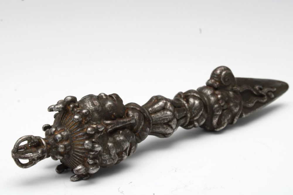 Lot 181: A Tibetan Iron Vajra with 3 Faces Possibly...