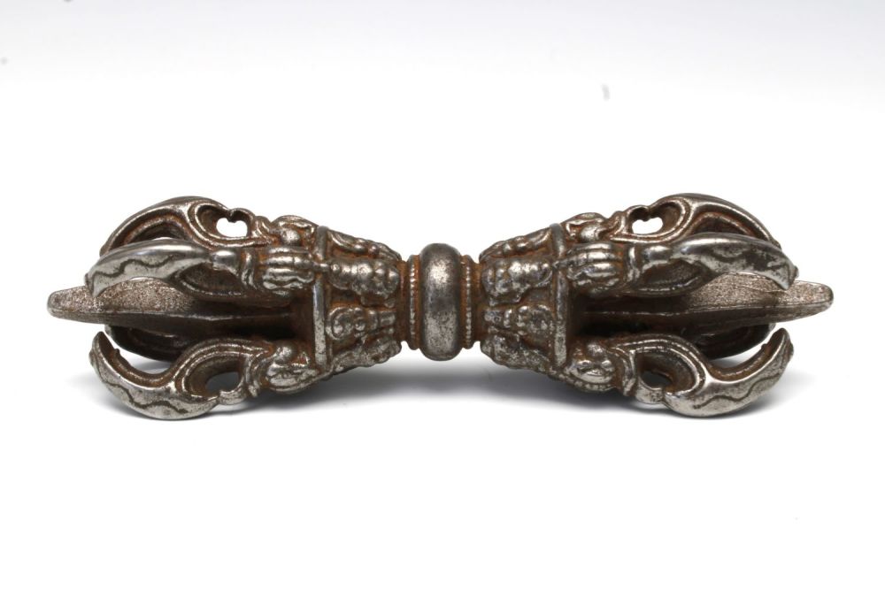 Lot 182: A Chinese Tibetan Buddhist Iron Vajra.