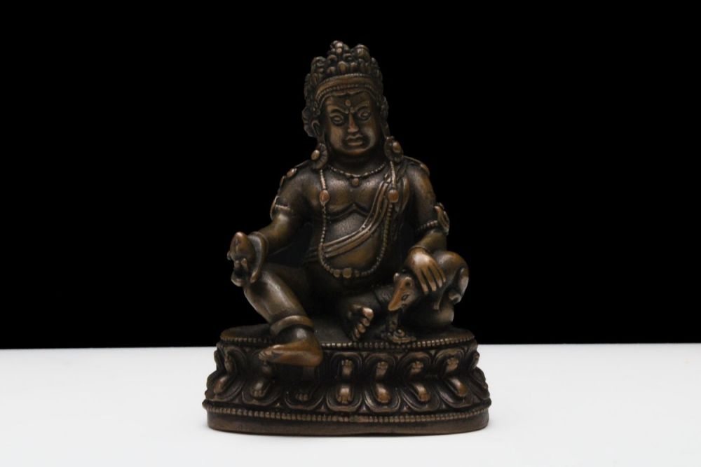 Lot 184: A Tibetan Bronze Buddhist Jambhala Statue from the...