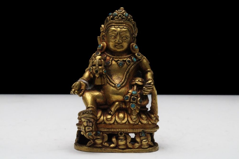 Lot 188: A Fine Tibetan Bronze Gilt God of Wealth...