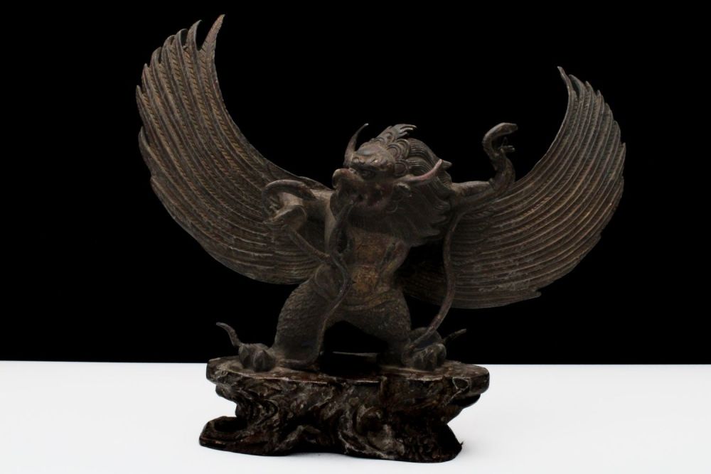 Lot 195: A Chinese Tibetan Bronze Figure of a Garuda...