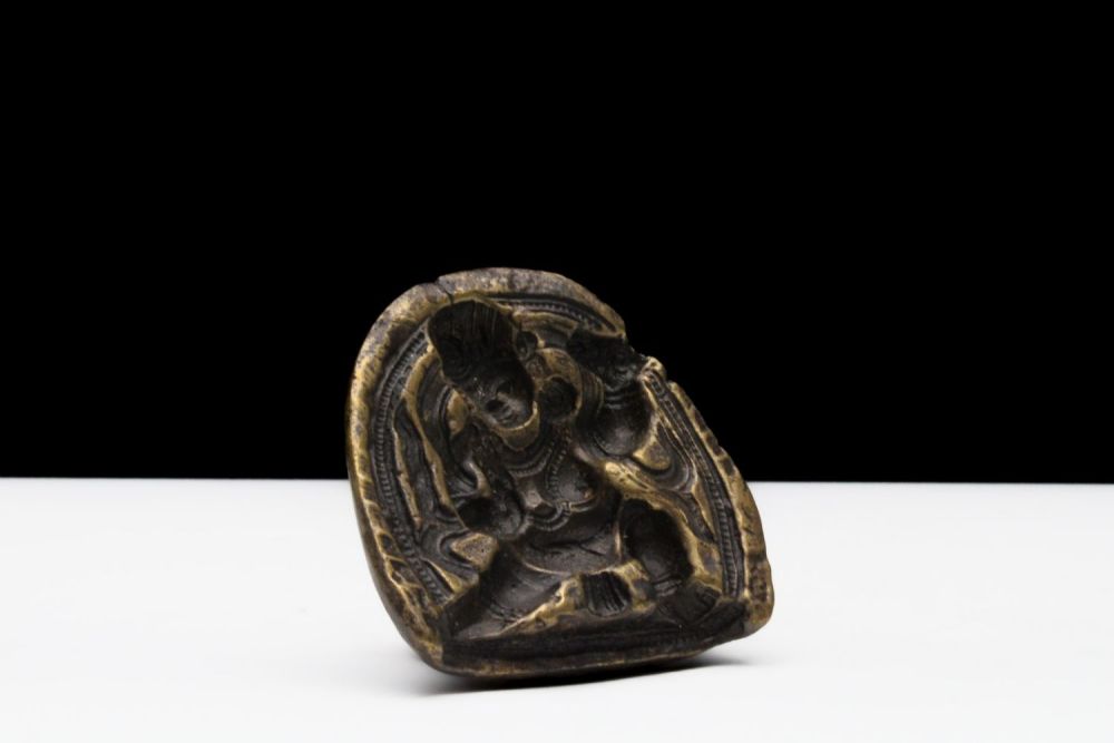 Lot 197: A Chinese Tibetan Bronze Tsa Tsa Mold Buddha.