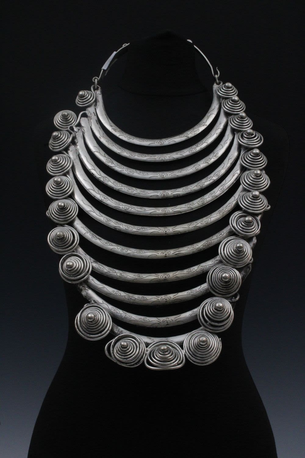 Lot 204: A Large Tribal Chinese Tibetan White Metal Necklace...