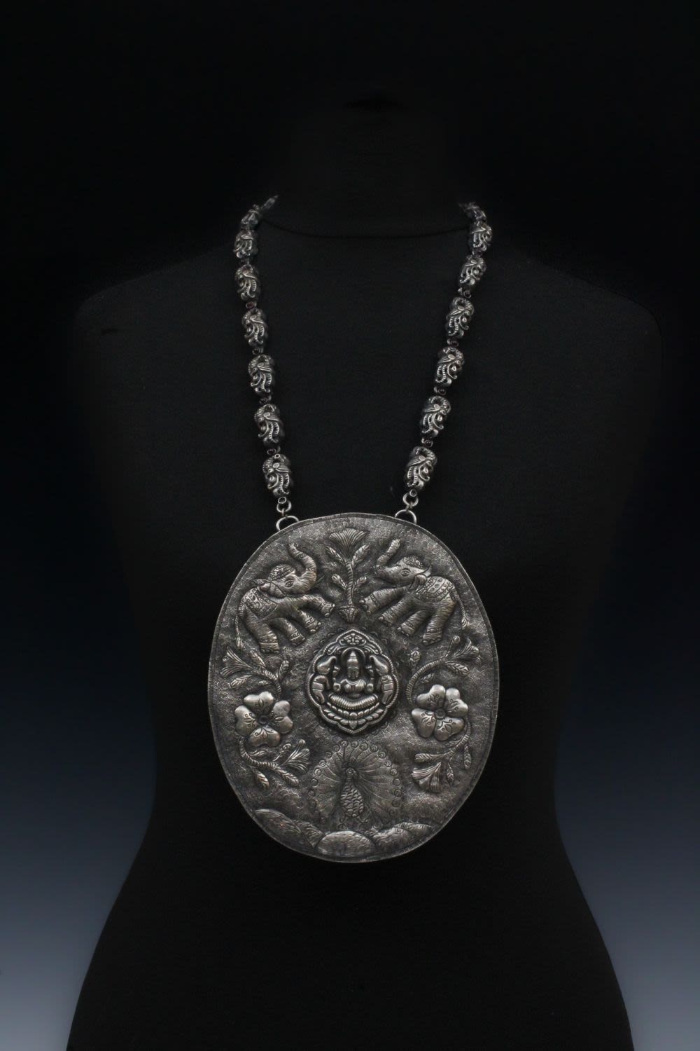 Lot 208: A Large Tribal Chinese Tibetan Silver Necklace Depicting...