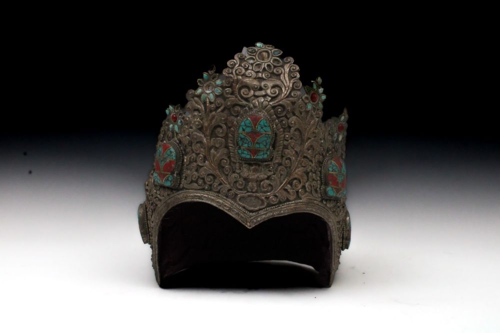 Lot 212: A Chinese Tibetan White Metal Ceremonial Crown Adorned...