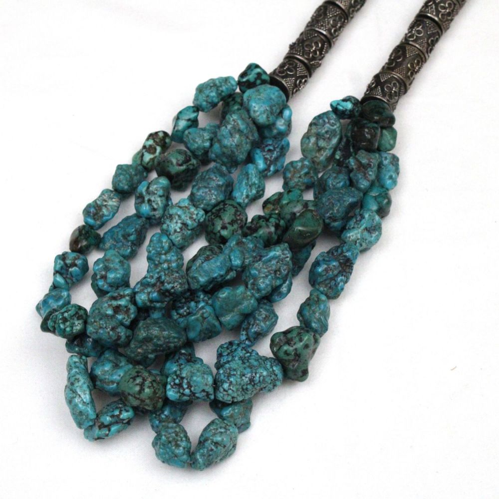 Lot 216: A Chinese Tibetan Silver and Turquoise Necklace.