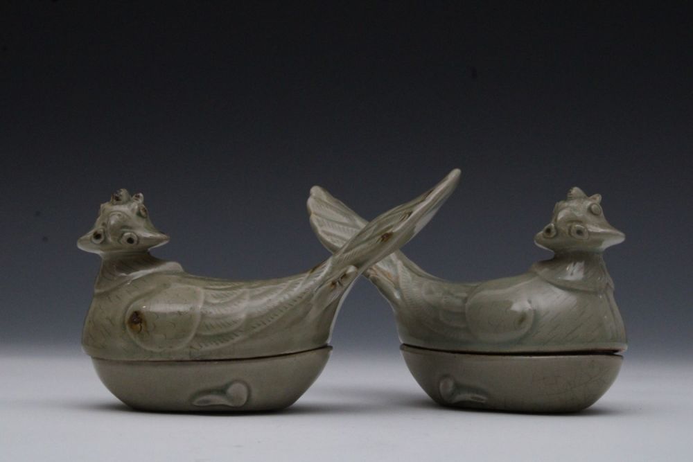 Lot 222: A Pair of Chinese Celadon Mandarin Duck Covered...