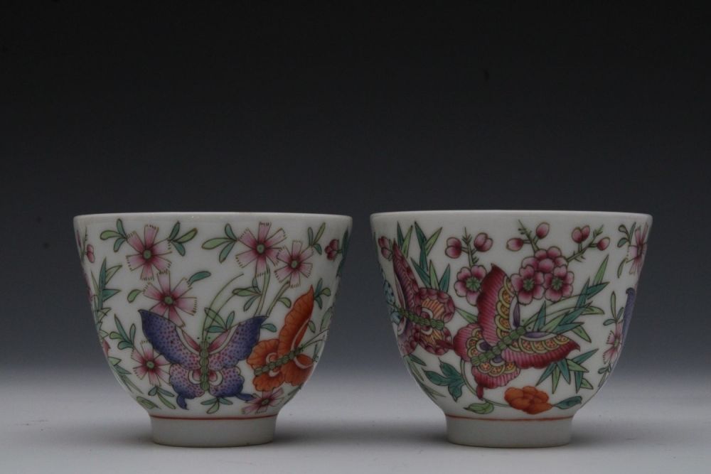 Lot 224: A Chinese Pair of Famille Rose Tea Cups...