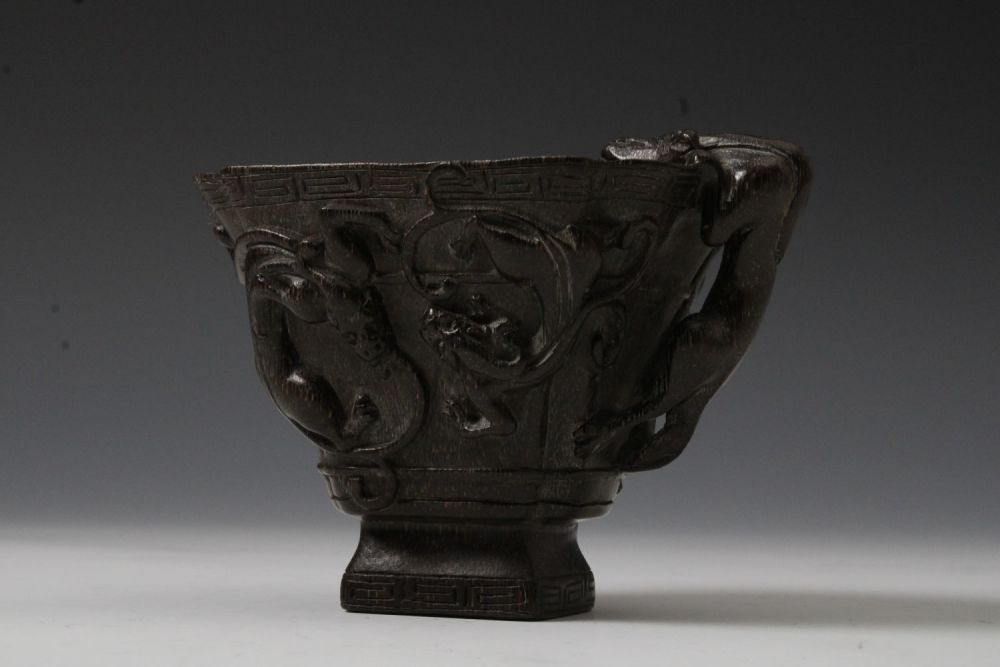 Lot 231: A Chinese Horn Libation Cup.
