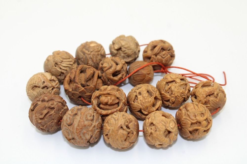 Lot 235: A Chinese Necklace made from Carved Nuts from...