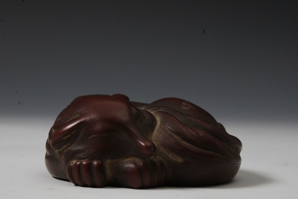 Lot 238: A Chinese Yixing Zisha Clay Figure of a...
