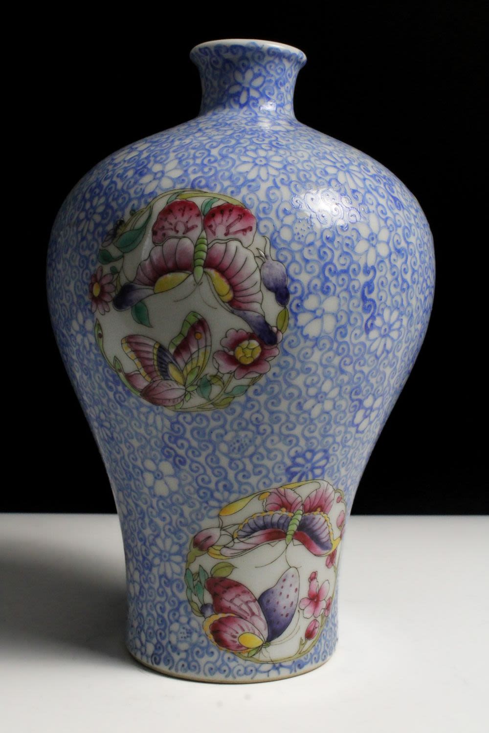 Lot 244: A Chinese Porcelain Vase Decorated with Butterflies and...