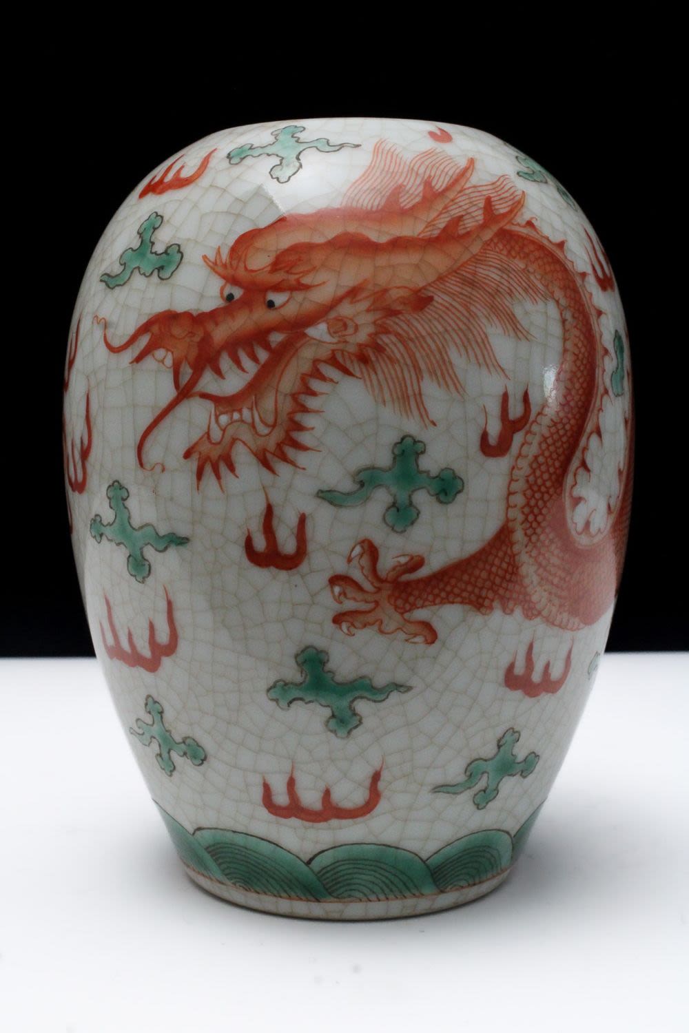 Lot 247: A Chinese Crackled Porcelain Jar Depicting a Dragon...