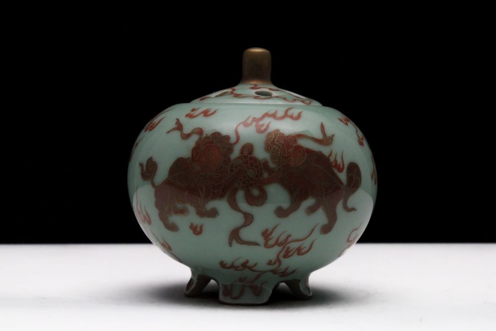 Lot 252: A Chinese Porcelain Incense Burner Depicting 2 Animials...