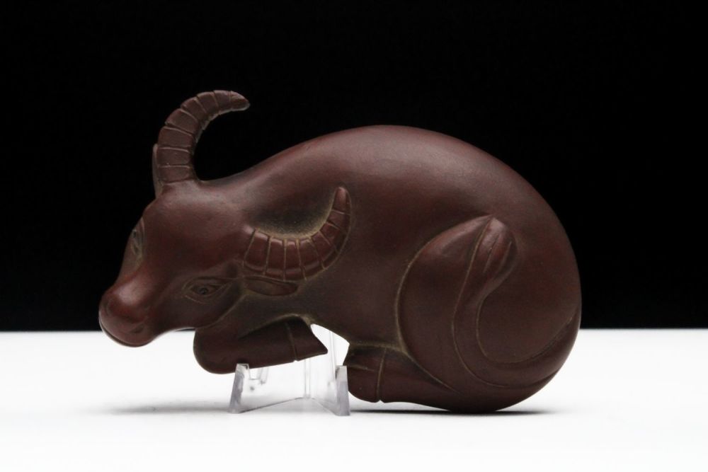 Lot 256: A Chinese Yixing Zisha Clay Figure of a...