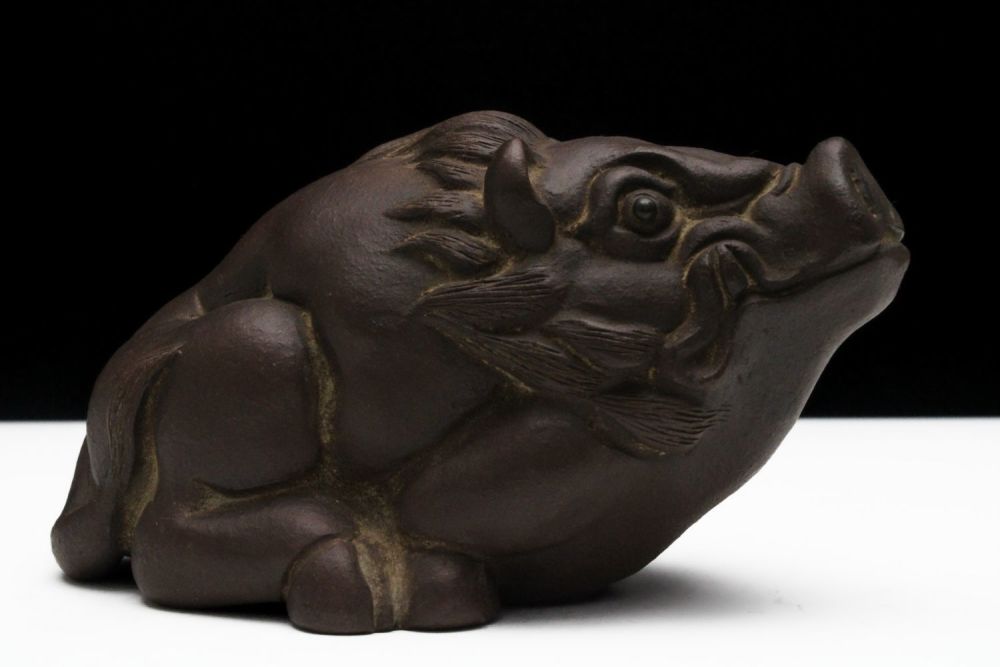 Lot 257: A Chinese Yixing Zisha Clay Figure of a...