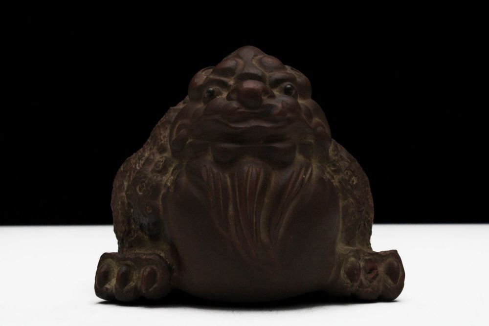 Lot 260: A Chinese Yixing Zisha Clay Figure of an...