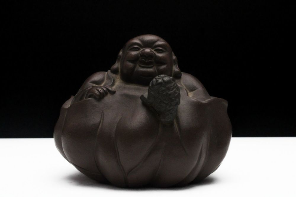 Lot 262: A Chinese Yixing Zisha Clay Laughing Buddha Statue...