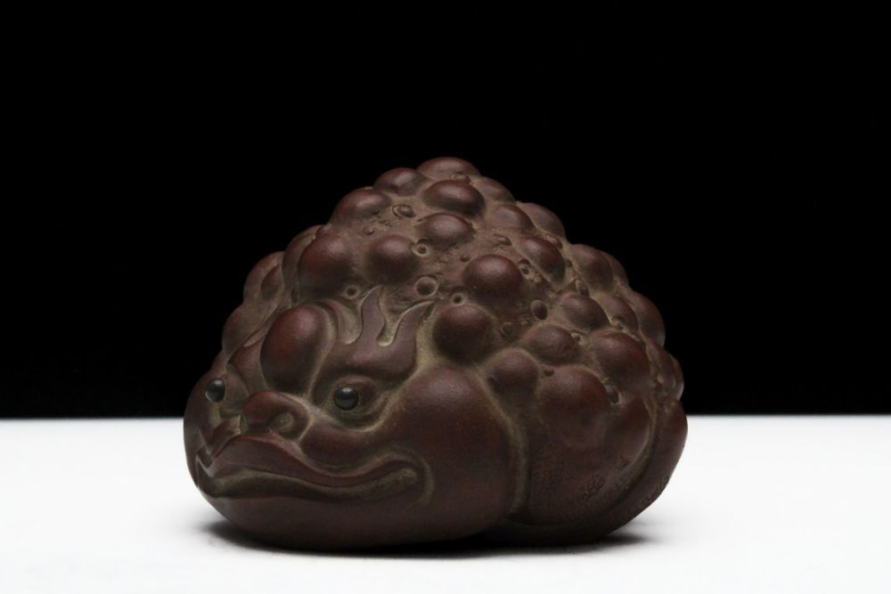 Lot 263: A Chinese Yixing Zisha Clay Figure of a...