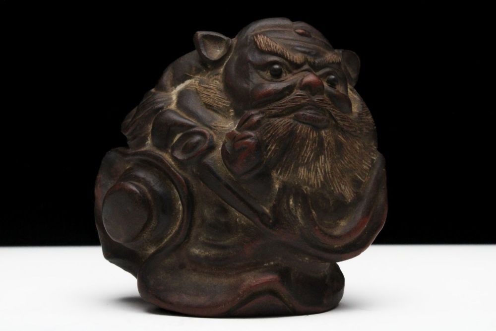 Lot 264: A Chinese Yixing Zisha Clay Buddha Statue.