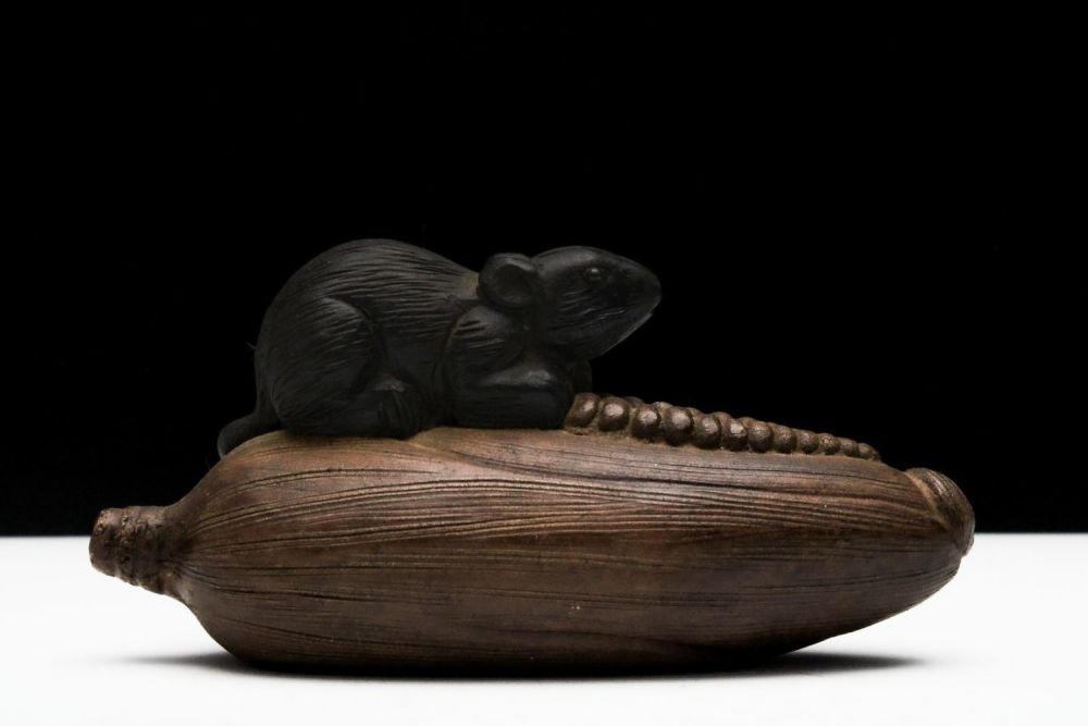 Lot 266: A Chinese Yixing Zisha Clay Figure of a...