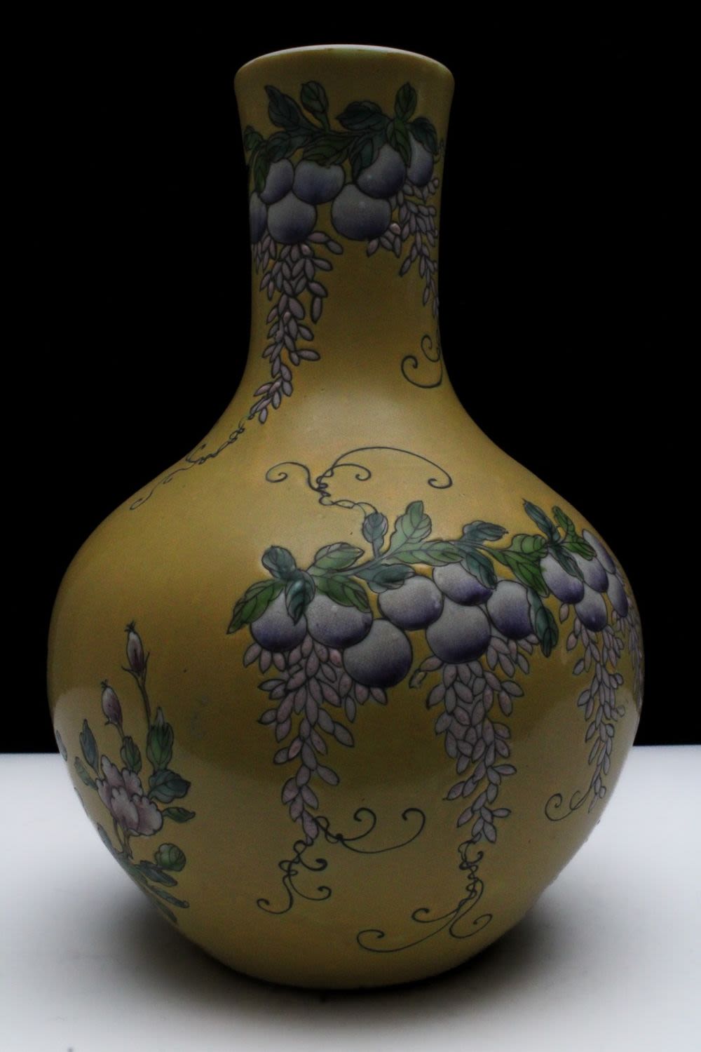 Lot 269: A Chinese Porcelain Yellow Ground Famille Rose Vase...