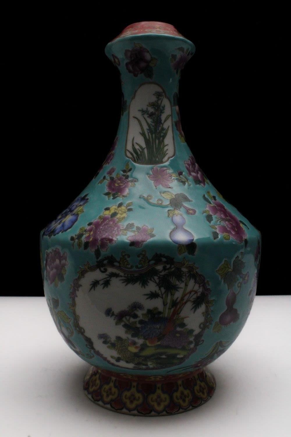 Lot 274: A Chinese Porcelain Blue Ground Famille Rose Vase...