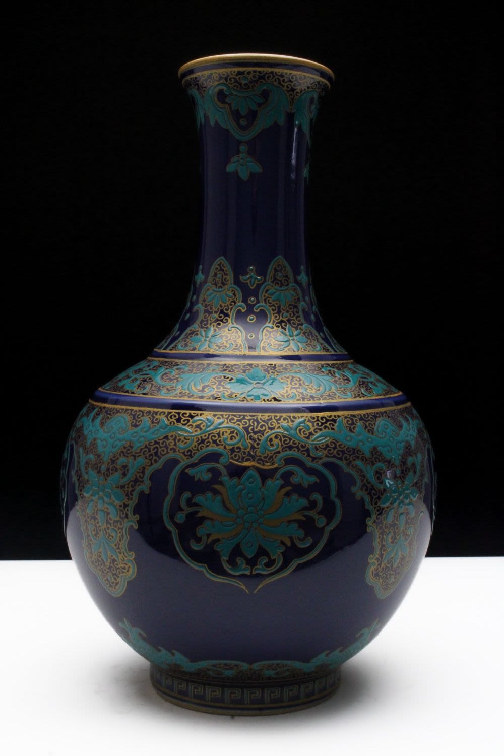 Lot 280: A Chinese Porcelain Enamel Blue Ground Vase with...