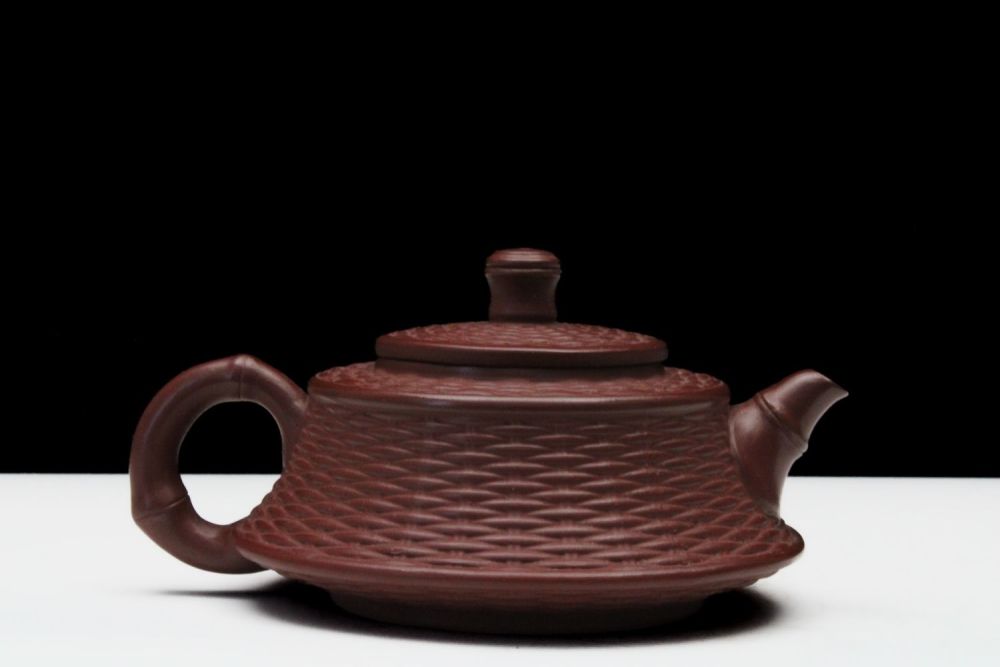 Lot 289: A Chinese Yixing Zisha Clay Tea Pot with...