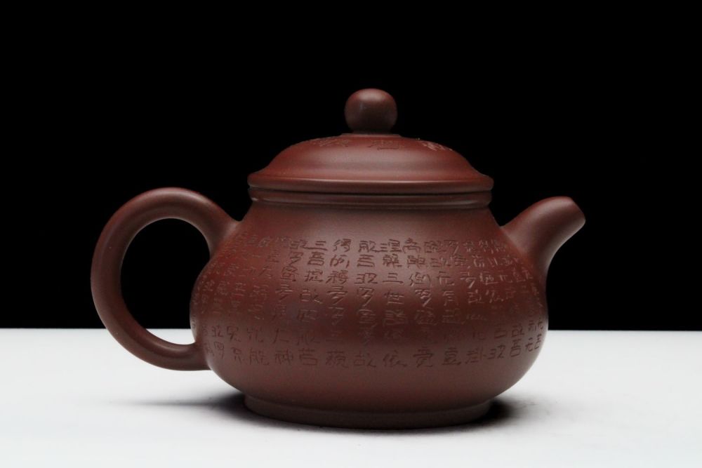 Lot 290: A Chinese Yixing Zisha Clay Tea Pot with...