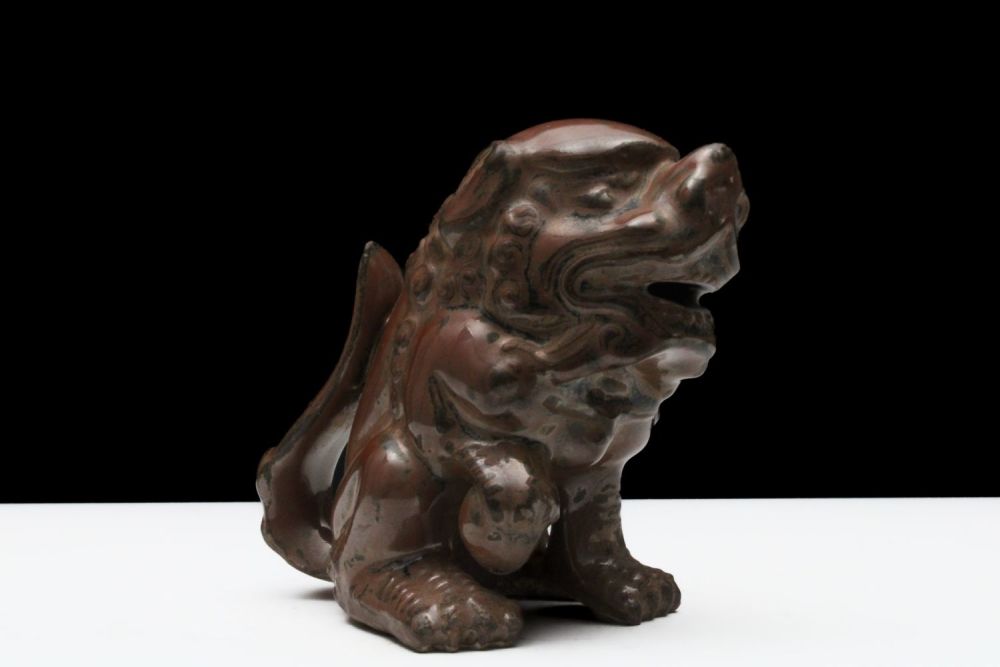 Lot 299: A Chinese Porcelain Brown Figure in the Shape...