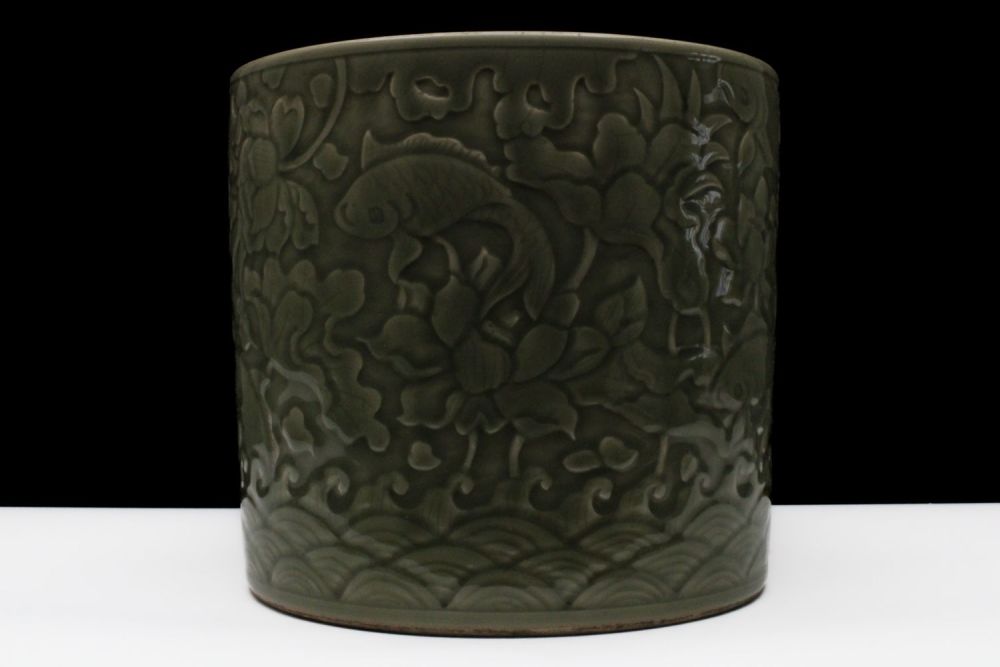 Lot 315: A Rare Chinese Celadon- Glazed Large Green Brush...