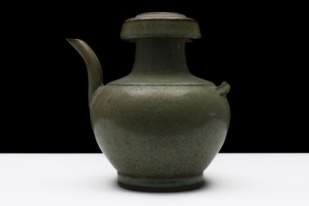Lot 318: A Rare Chinese Celadon- Glazed Jug with 2...