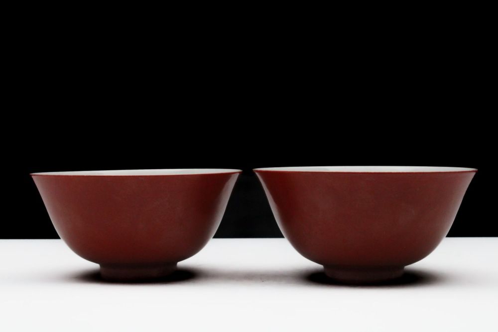 Lot 320: A Chinese Pair of Porcelain Coral Red Glazed...