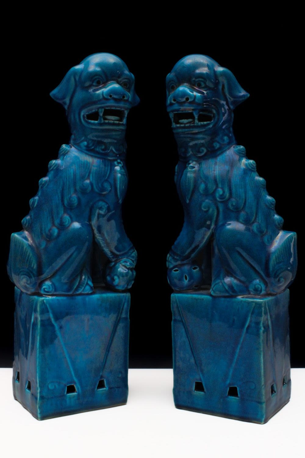 Lot 327: A Pair of Chinese Porcelain Turquoise Figures of...