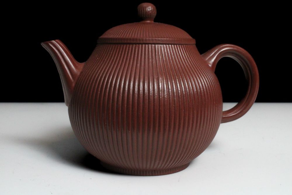 Lot 338: A Chinese Yixing Zisha Teapot with Character Marks...
