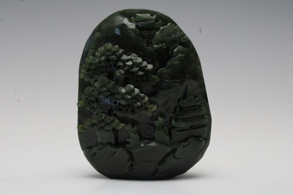 Lot 358: A Chinese Green Jade Large Pendant Depicting a...