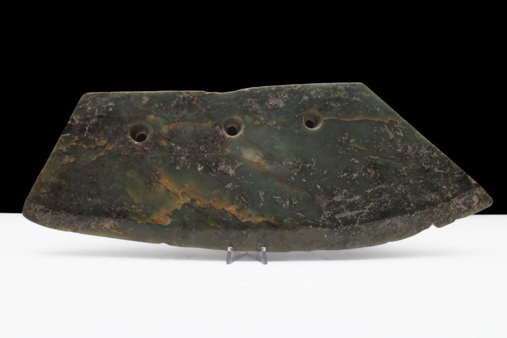 Lot 359: A Chinese Green Jade Large Axe Head.
