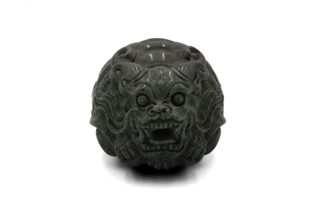 Lot 362: A Chinese Green Jade Carving in the Shape...