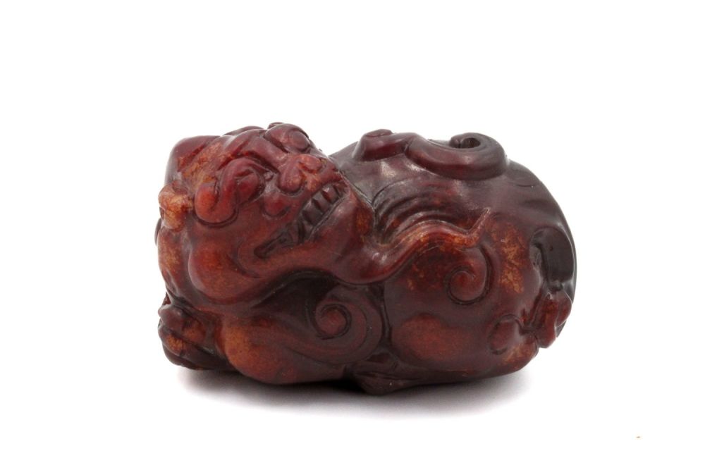 Lot 373: A Rare Chinese Jade Figure of an Animal.