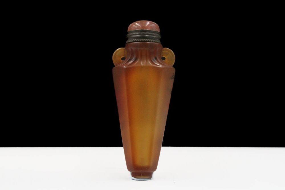 Lot 375: A Chinese Agate Uniquely Carved Snuff Bottle.