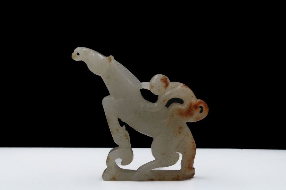 Lot 386: A Rare Chinese Jade Hand Carved Figure of...