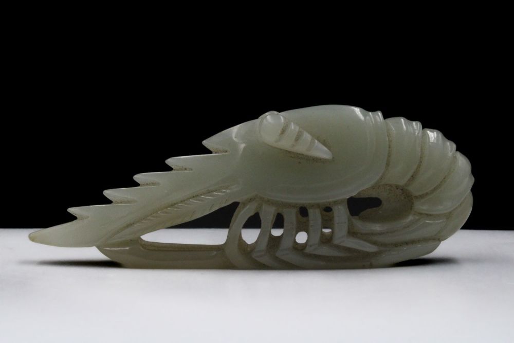 Lot 387: A Chinese Hand Carved Jade Figure of a...