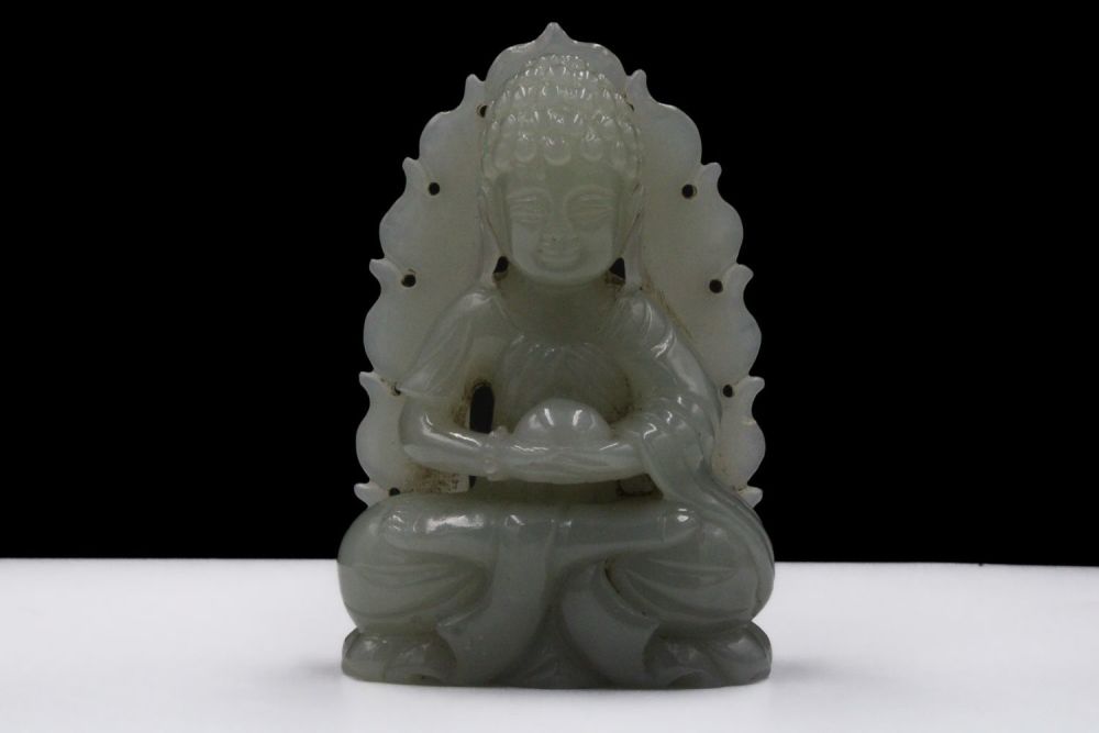Lot 388: A Rare Chinese Tibetan Hand Carved Jade Figure...