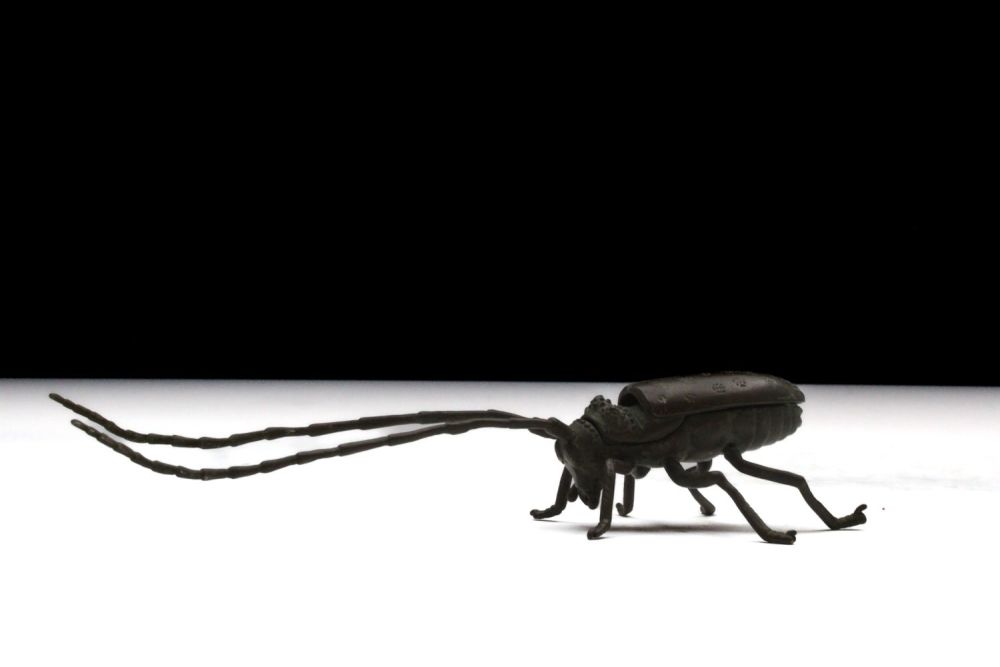 Lot 396: A Japanese Bronze Okimono Figure of a Beetle...